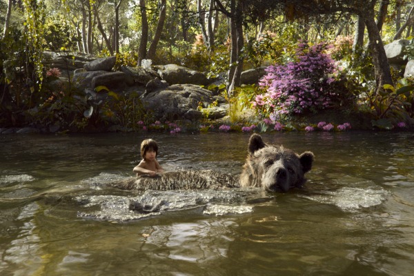 Neel Sethi with Baloo in a still from The Jungle Book